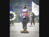 A U.S. Marine with Battalion Landing Team 1/4, 15th Marine Expeditionary Unit, holds the portrait of Cpl. Cesar A. Villanueva, 21, of Riverside, California, during a memorial service at Marine Corps Base Camp Pendleton, California, Aug. 21, 2020. 