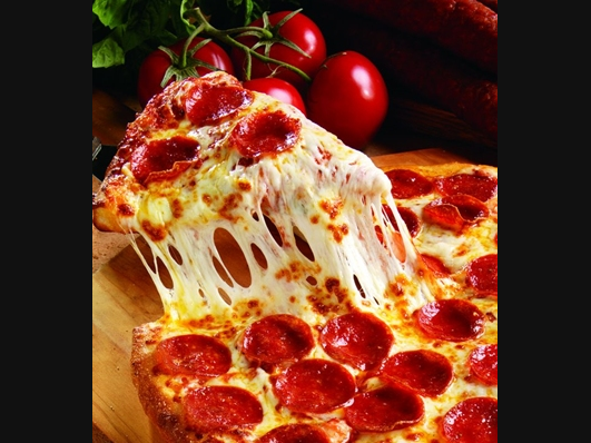 The Marco’s menu features a mix of classic and original specialty pizzas, plus a variety of "Pizza Bowls" — a crustless pizza baked in a bowl.