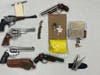 Firearms and drugs allegedly found in Abshear's vehicle.