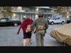 A person taken into custody during a search warrant service Wednesday.