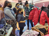Nolan Haynes, Jr., 9, from Cabazon, selects a jacket donated by Morongo at Saturday’s Christmas in Cabazon Brunch with Santa hosted by the James A. Venable Community Center.
