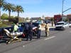 The suspect was receiving treatment in the back of a Menifee police car.