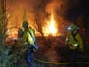Murrieta Fire & Rescue crews tackle the fires that began shortly before 9 p.m. Sunday.