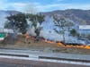 The vegetation fire burning Tuesday night off Interstate 10 in Banning.