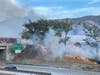 The vegetation fire burning Tuesday night off Interstate 10 in Banning.