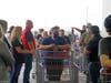 Shoppers line up Friday morning to be among the first to enter the new Costco store.
