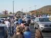 Shoppers line up Friday morning to be among the first to enter the new Costco store.