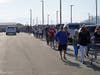 Shoppers line up Friday morning to be among the first to enter the new Costco store.