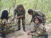 The Northern Team of the Black Mamba Anti-Poaching Unit removes a snare and checks tracks.