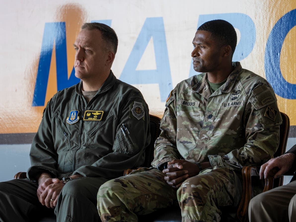Lt. Col. Stephen Brooks, deputy commander of the U.S. Army Corps of Engineers Los Angeles District (right), sits with Col. Bryan Bailey, commander of the 452nd Air Mobility Wing, during the Dec. 16 groundbreaking ceremony at March Air Reserve Base.