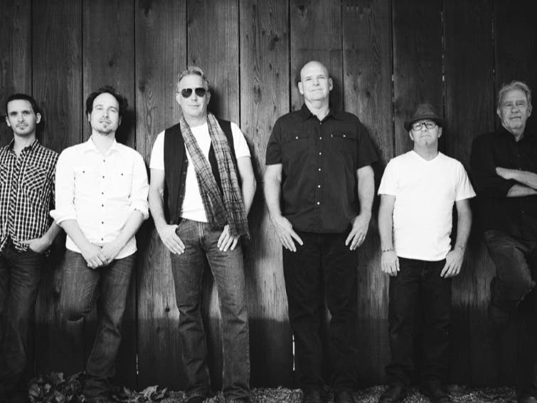 Kevin Costner (third from left) and Modern West.