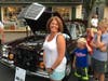 Pamela from Dublin, here with her family for the 2nd year, admires this 1970 Mercedes Benz 300SEL 6.3.