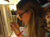 Young person examines manuscript from Glencairn Museum’s collection.
