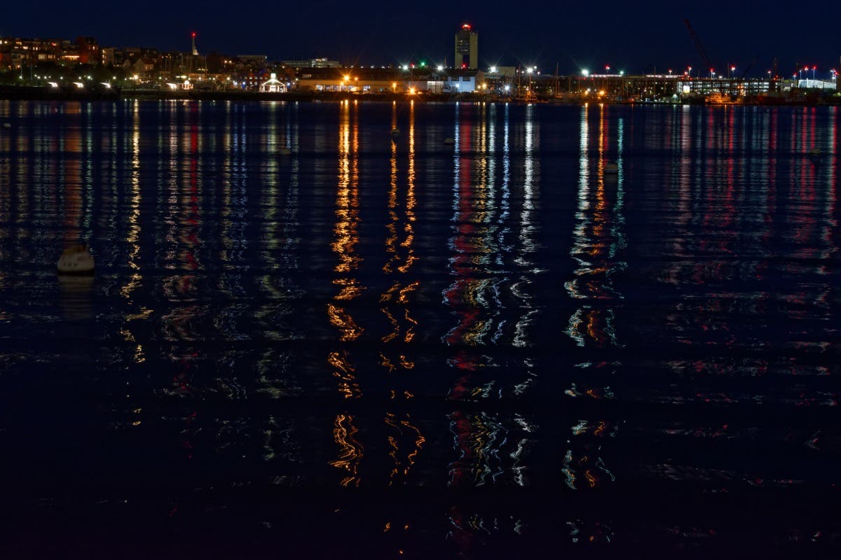 Looking across Boston Harbor to Logan International Airport. - Vimarsana News